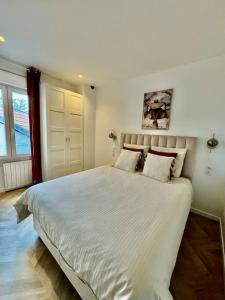 Appartements Appartement Cosy proche de Disney, Paris et Charles de Gaulle : photos des chambres