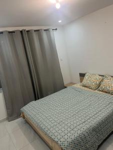 Appartements T2 dans une villa : photos des chambres