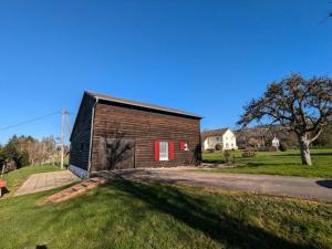 Maisons de vacances Chalet familial avec grand jardin et equipements pour enfants, a 500m du centre de Ban-sur-Meurthe - FR-1-589-33 : photos des chambres