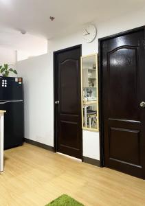 Pet-friendly 1BR Condo Unit in Imus with Wifi Netflix -Min 2 nights