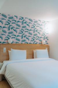 Hotels Kyriad Cannes - Mandelieu : photos des chambres