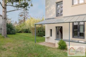 Appartements Charmante Maisonnette avec Jardin, Parking Prive a Proximite d-Eurexpo : Appartement 2 Chambres