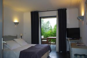 Hotels Du Cote Des Olivades : photos des chambres