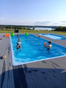 Domki Rekreacyjne "Błękitne Wzgórze"