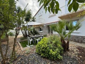 Appartements Le jardin d-Henri : photos des chambres