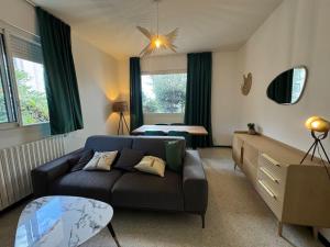 Appartements Le jardin d-Henri : photos des chambres