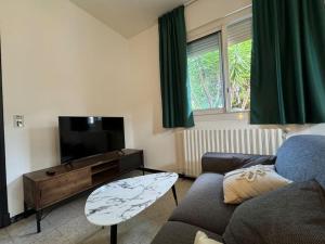 Appartements Le jardin d-Henri : photos des chambres