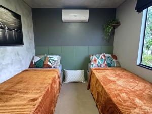 Apê térreo sem escada com Ar Cond, WiFi e banheira!