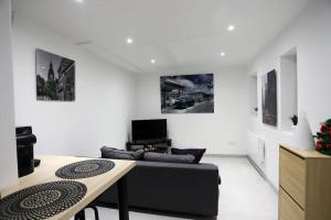 Appartements duplex chaleureux avec spa prive : photos des chambres