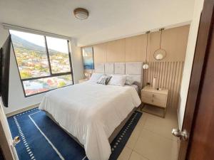 Upper Scale and Cozy Apart in the Heart of Escalon