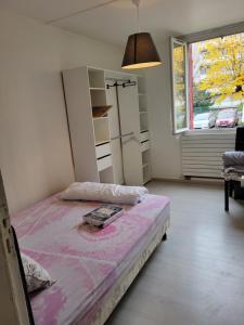 Appartements Appartement 4 chambres face carrefour de Stains : photos des chambres