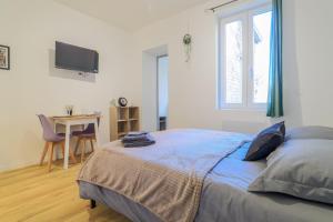Appartements ZenkaSerenity 2- 3 min Gare-IUT-Centre, Tout confort : photos des chambres