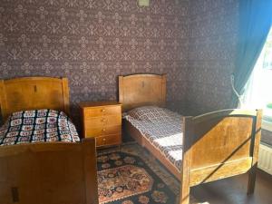 Hirsitalo maalla Log house at the countryside