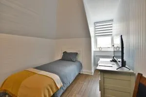 Chambre 302 de l'hôtel Victoria confortable et moderne - Saint-Athanase