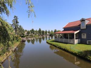 House on the water with fishing platform