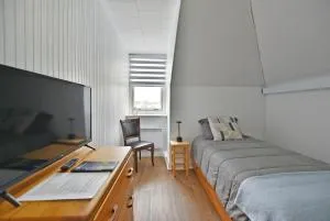 Chambre 301 de l'hôtel Victoria confortable et moderne - Saint-Athanase