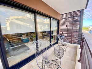 Modern 2-Bedroom, 2-Bath Apartment in the Heart of Playa del Carmen- Arenis Condos