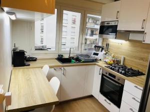 Appartements appartement tout confort a 10min Paris la Defense : photos des chambres