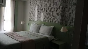 comfort hotel 413 anfitriã - 塔瓜汀加