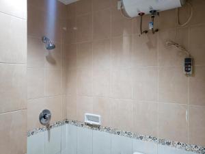 Minimalist and Comfy 1BR at The Boulevard Apartment By Travelio