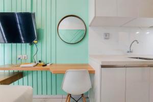 Modern Look Studio at Sky House Alam Sutera Apartment By Travelio