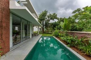 La Masseria, 3 BHK Premium villas with Private Pool close to Morjim Beach, Garden, Terrace, Security, Kitchen & Wifi in a Peaceful location