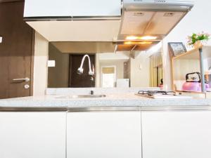 Homey and Cozy 1BR Apartment at Harvard Jatinangor By Travelio