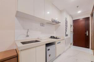 Cozy Living and Comfy Studio Sky House BSD Apartment By Travelio