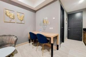 Cozy Living 1BR Collins Boulevard Apartment By Travelio