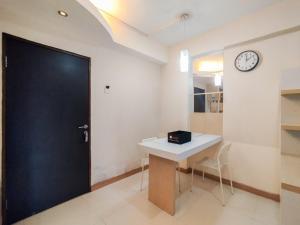 Best Deal and Comfy 1BR Apartment Gateway Ahmad Yani Cicadas By Travelio