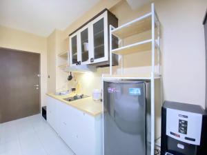 Simply Homey Studio at Stanford Jatinangor Apartment By Travelio