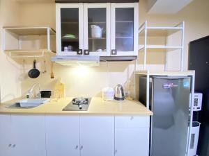 Simply Homey Studio at Stanford Jatinangor Apartment By Travelio