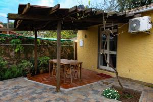 Monolocale con veranda e giardino a Rio Marina