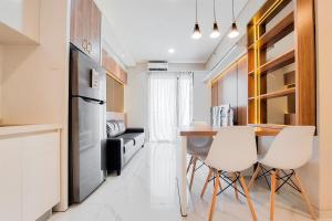 Well Designed and Comfy 2BR Sky House BSD Apartment By Travelio