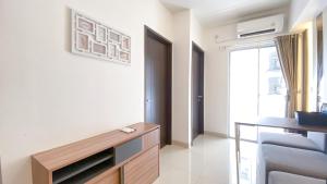 Nice and Homey 2BR at Citra Living Apartment By Travelio