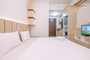 Good Deal and Homey Studio at Transpark Cibubur Apartment near Mall By Travelio