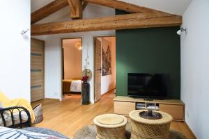 Appartements Gite de l'Autre Jardin : photos des chambres