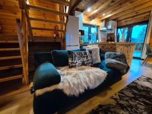 Chalets Le Chalet Aura et Jacuzzi : photos des chambres
