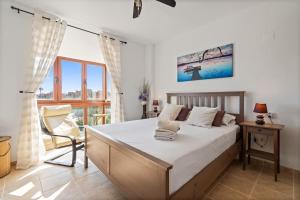 Casa Azul Penthouse with Veranda, Rooftop Terrace & Sea, Pool, Garden, Mountain Views in Casares Costa RDR447