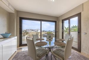 2218-Duplex Penthouse first line beach with sea view Manilva