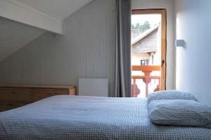 Appartements Appartement avec vue et jardin : photos des chambres