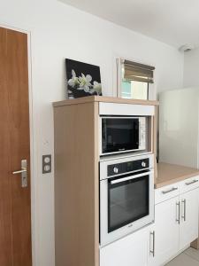Appartements NOISETTE- T2 lumineux, proche centre ville en RDC, tres bien equipe avec terrasse : photos des chambres