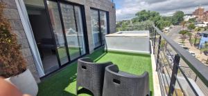 Vivisierras, Piso 3 frente al lago, centro Villa Carlos Paz, 2 dormitorios, 2 baños, pileta privada, premium