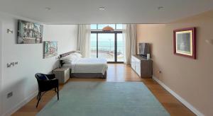 SLR-98 Beach Penthouse · Spectacular 4 BR Beachfront Penthouse