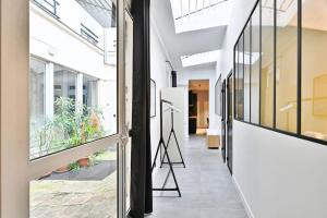 Appartement style industriel au cœur du sentier - V