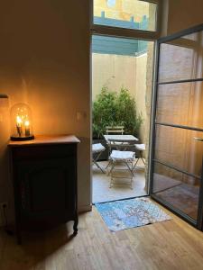 Villas maison pierre centre Uzes climatisation garage : photos des chambres