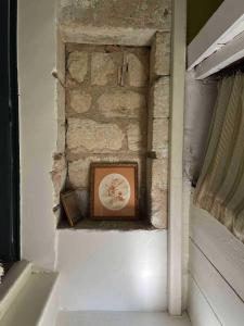 Villas maison pierre centre Uzes climatisation garage : photos des chambres