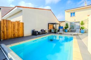 Maisons de vacances La villa de Domi 4 chambres piscine : photos des chambres