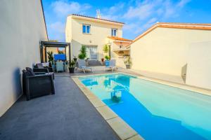 Maisons de vacances La villa de Domi 4 chambres piscine : photos des chambres