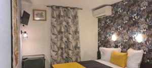 Hotels Hotel L'Etoile Aeroport - A61 : photos des chambres